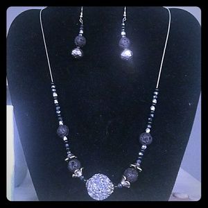 Essential oil diffuser necklace and earring set.